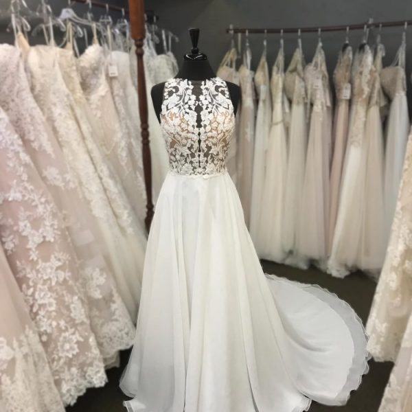A beautiful wedding dress with a detailed bodice at Victorian Bridal & Formal Wear in Waupaca, WI