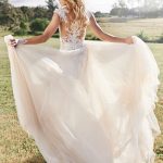 The Nicole Spose gown with lace backing