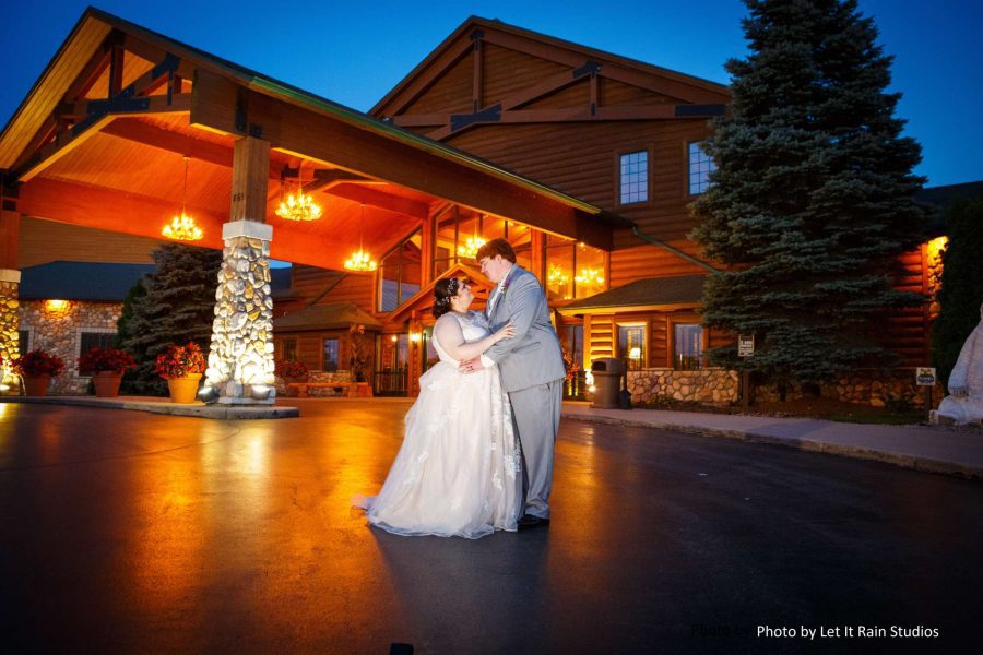 Bride and groom outside the Tundra Lodge Resort in Green Bay, WI