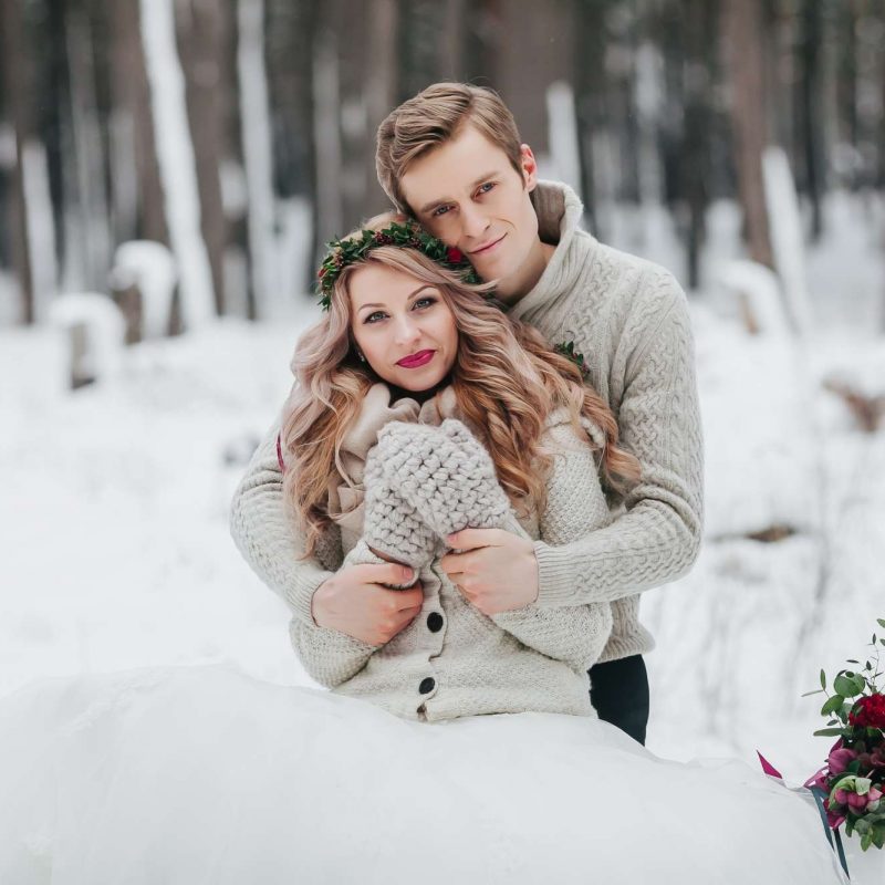 Bride and groom in snow- Elkhart Lake Wedding Showcase