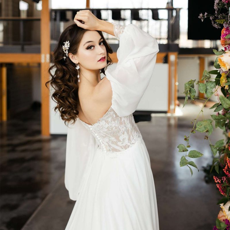 Stunning bride in romantic wedding gown.