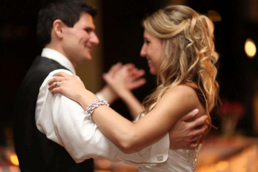 Bride and Groom dance at their Landmark Resort wedding reception.