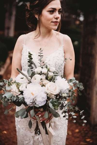 Bride with lush bouquet.