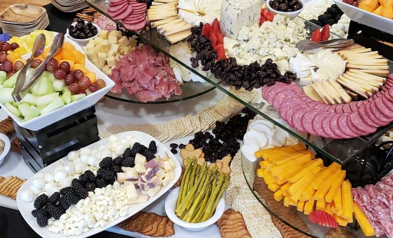 Cold cuts and cheese platters with fruit by On Point Catering Services at UW Stevens Point