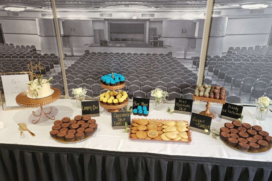 Dessert table with cupcakes, cookies, and bars from the Cupcake Couture.