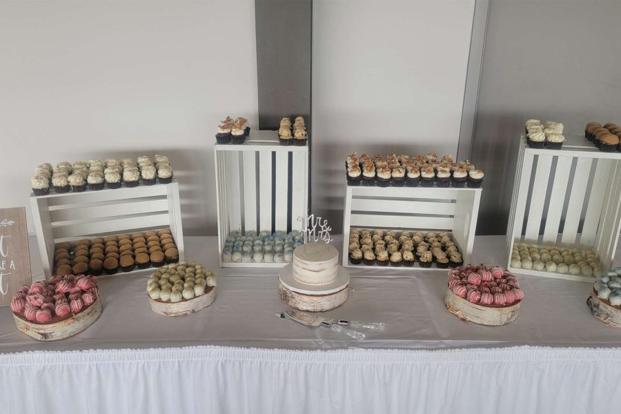 Dessert table created by the Cupcake Couture.